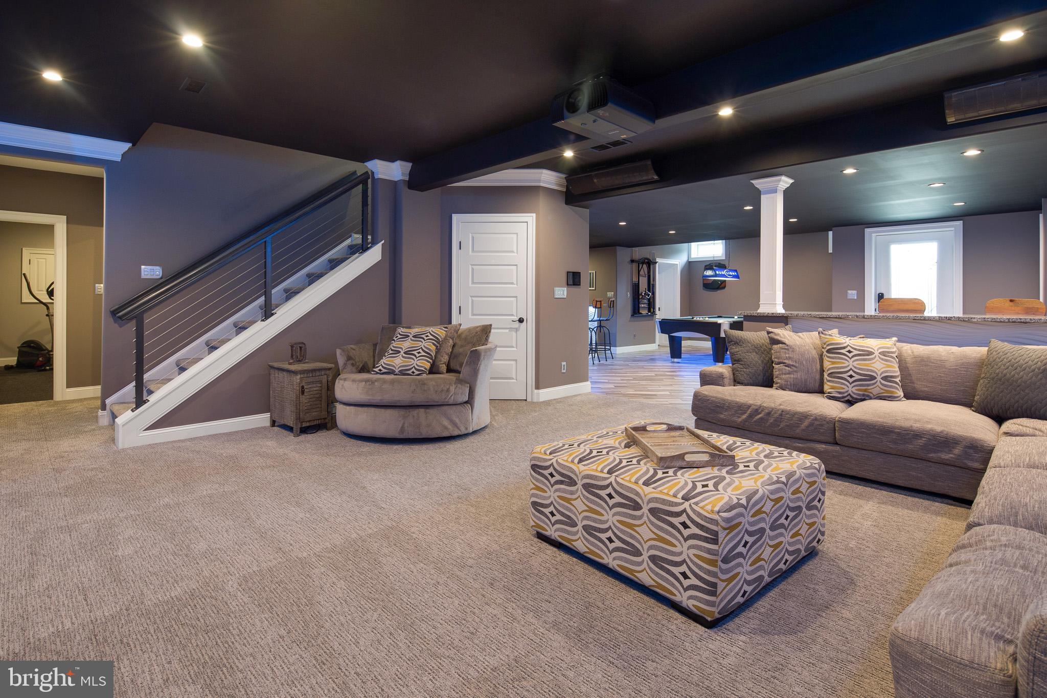 440 Spring Hollow Drive Middletown, DE 19709 - Photo 36 of 64 a living room with furniture and a large window