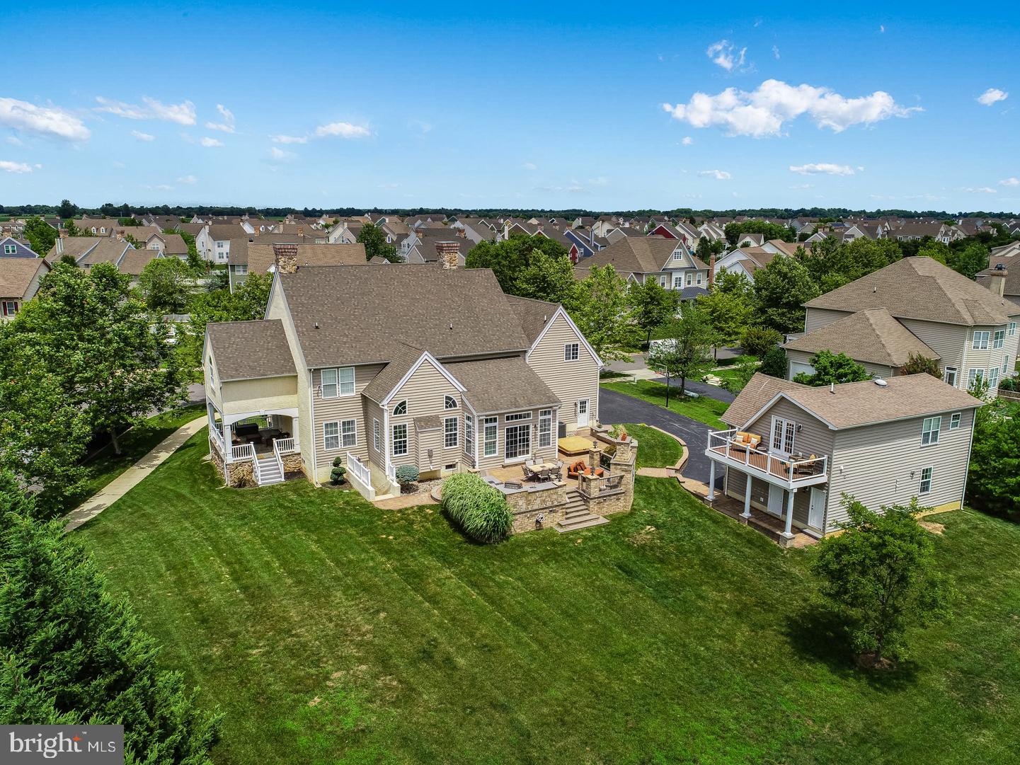 440 Spring Hollow Drive Middletown, DE 19709 - Photo 46 of 64 an aerial view of a house with a garden and lake view