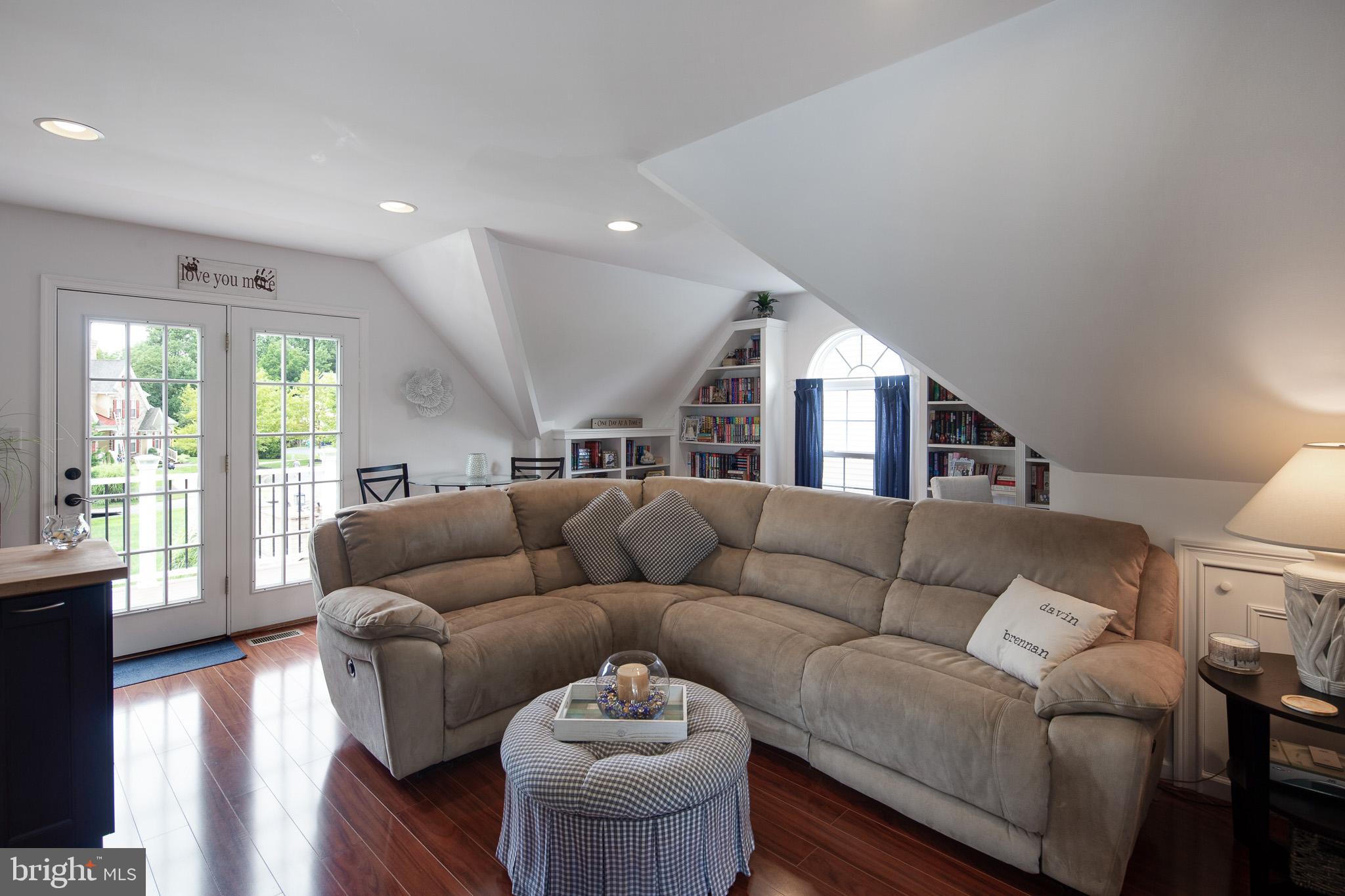 440 Spring Hollow Drive Middletown, DE 19709 - Photo 49 of 64 a living room with furniture and a large window