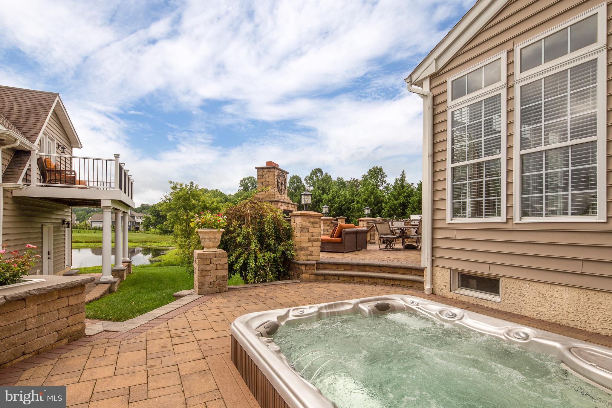 440 Spring Hollow Drive Middletown, DE 19709 - Photo 53 of 64 a view of a backyard with sitting area