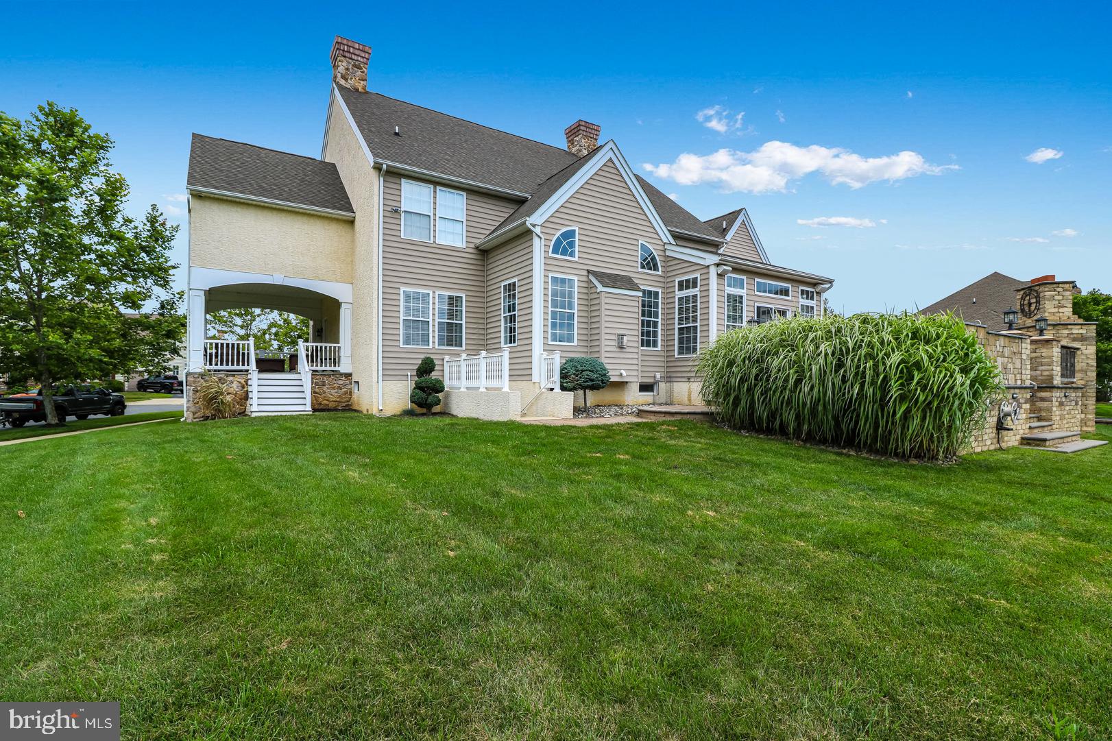 440 Spring Hollow Drive Middletown, DE 19709 - Photo 57 of 64 a front view of a house with garden