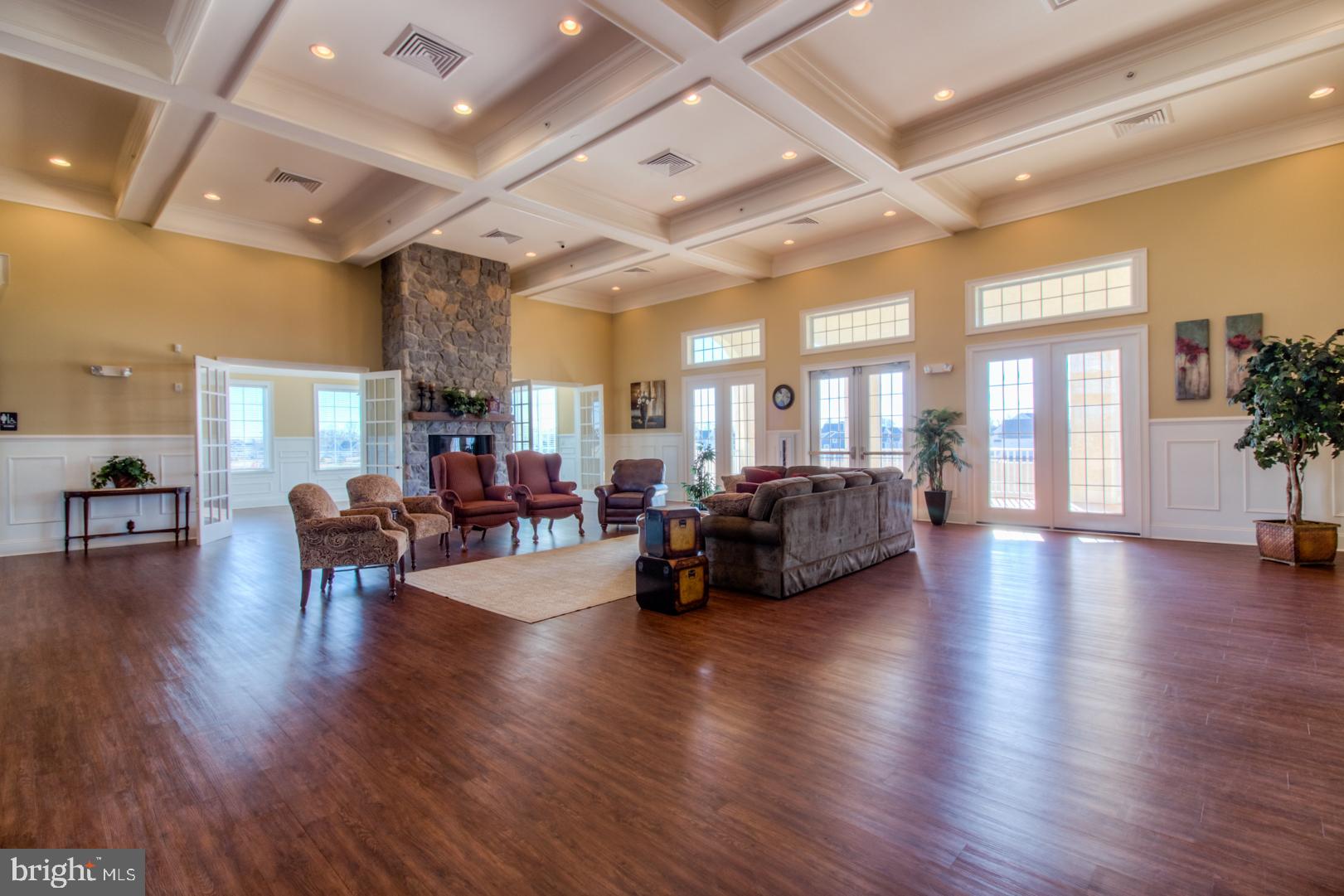 440 Spring Hollow Drive Middletown, DE 19709 - Photo 63 of 64 a living room with furniture and a wooden floor
