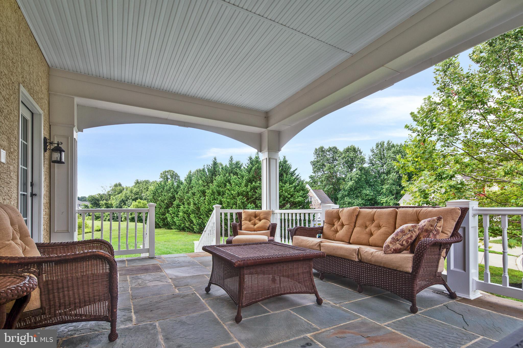 440 Spring Hollow Drive Middletown, DE 19709 - Photo 8 of 64 a outdoor living space with furniture and garden view