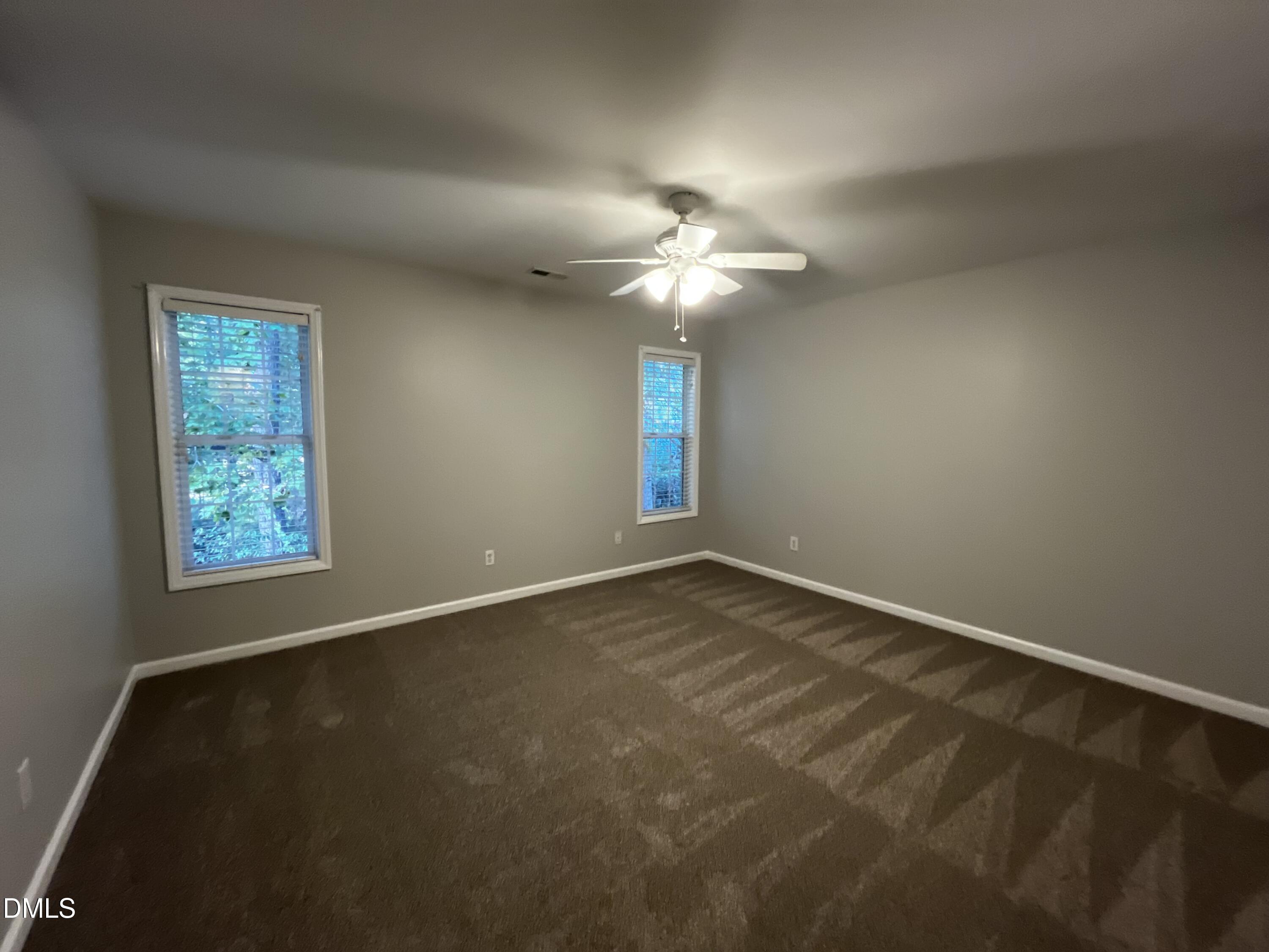 2816 Rainford Court Raleigh, NC 27603 - Photo 13 of 17 a view of an empty room with a window