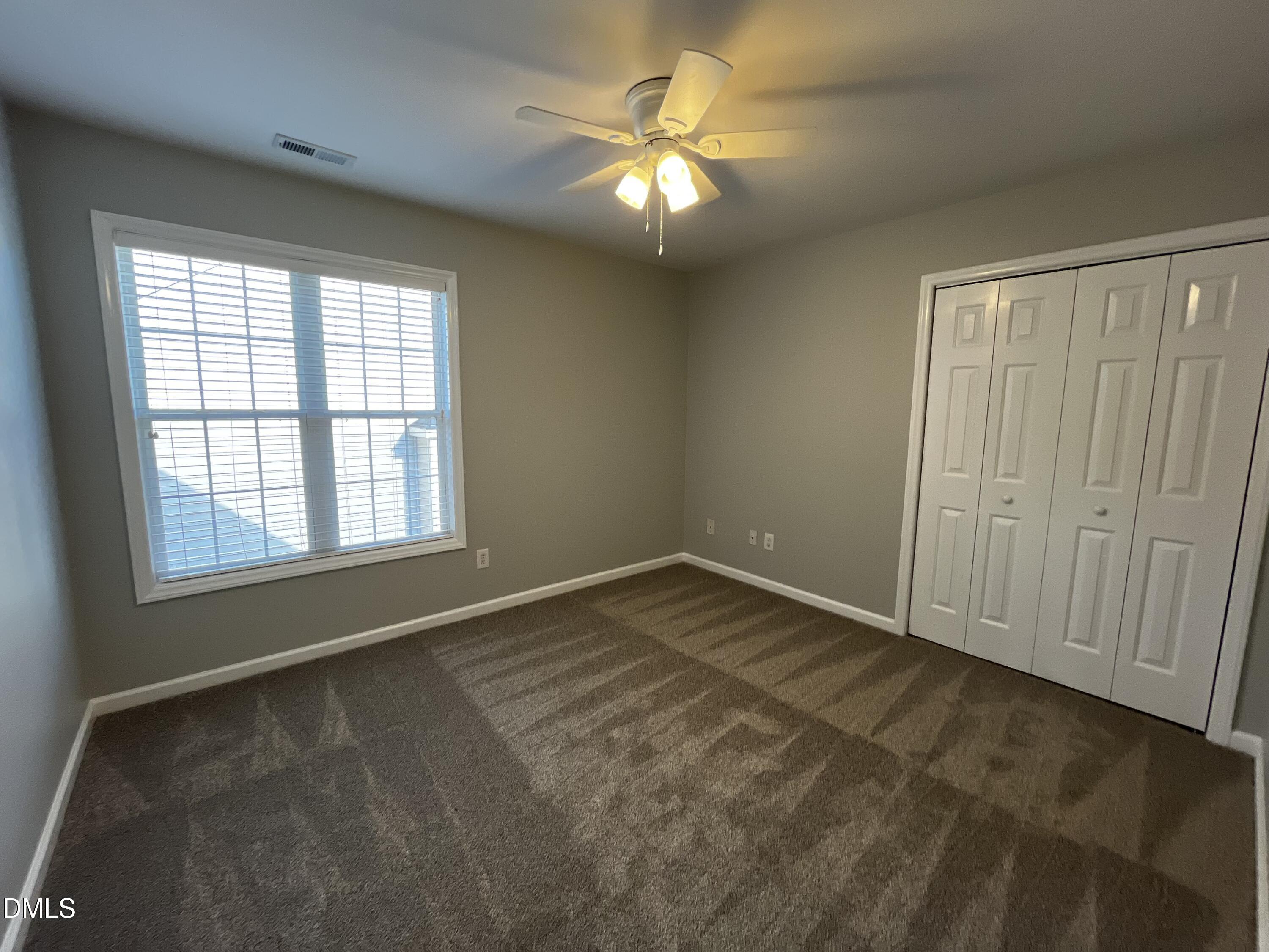 2816 Rainford Court Raleigh, NC 27603 - Photo 14 of 17 an empty room with a window