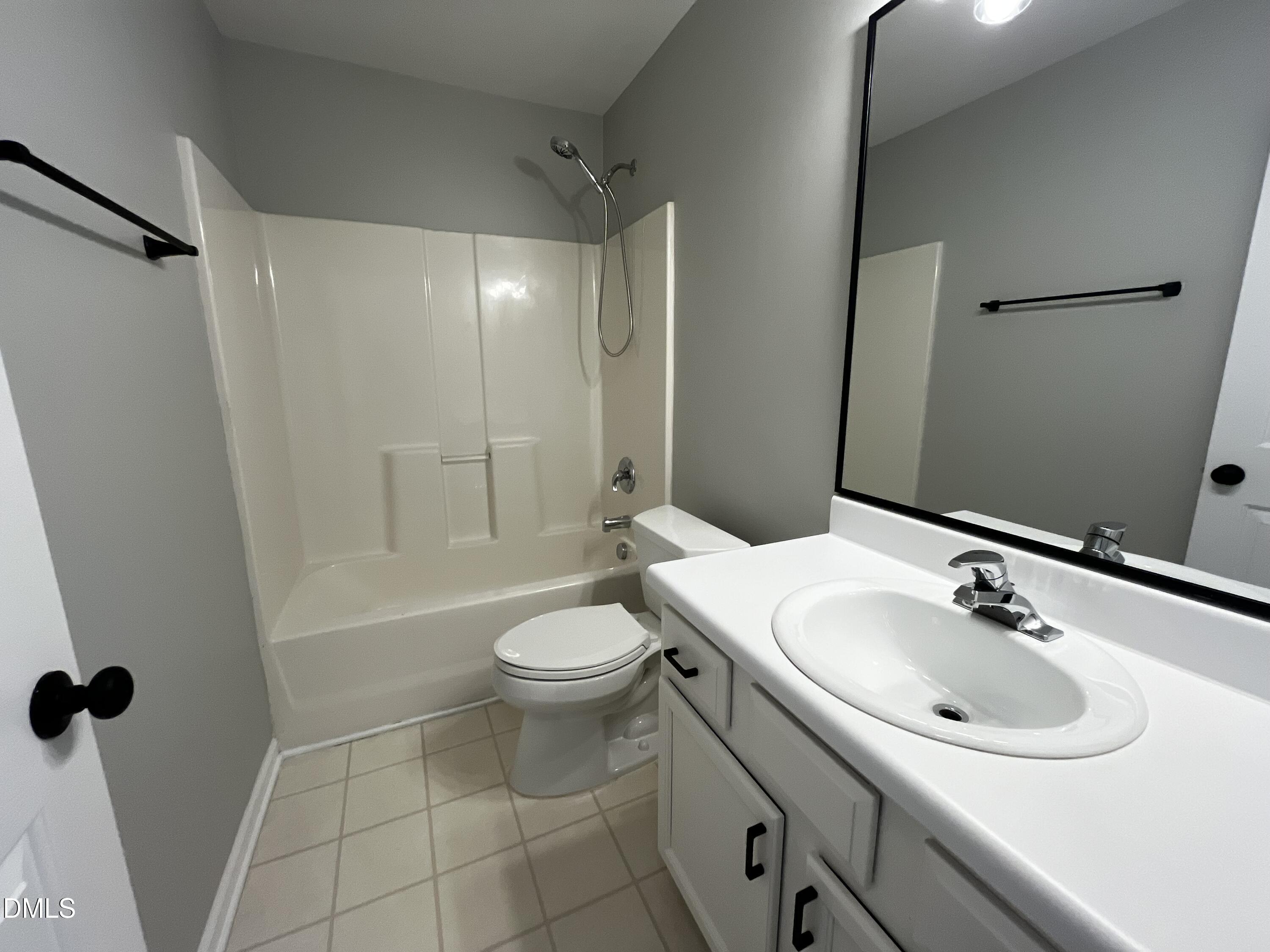 2816 Rainford Court Raleigh, NC 27603 - Photo 16 of 17 a bathroom with a sink toilet and shower