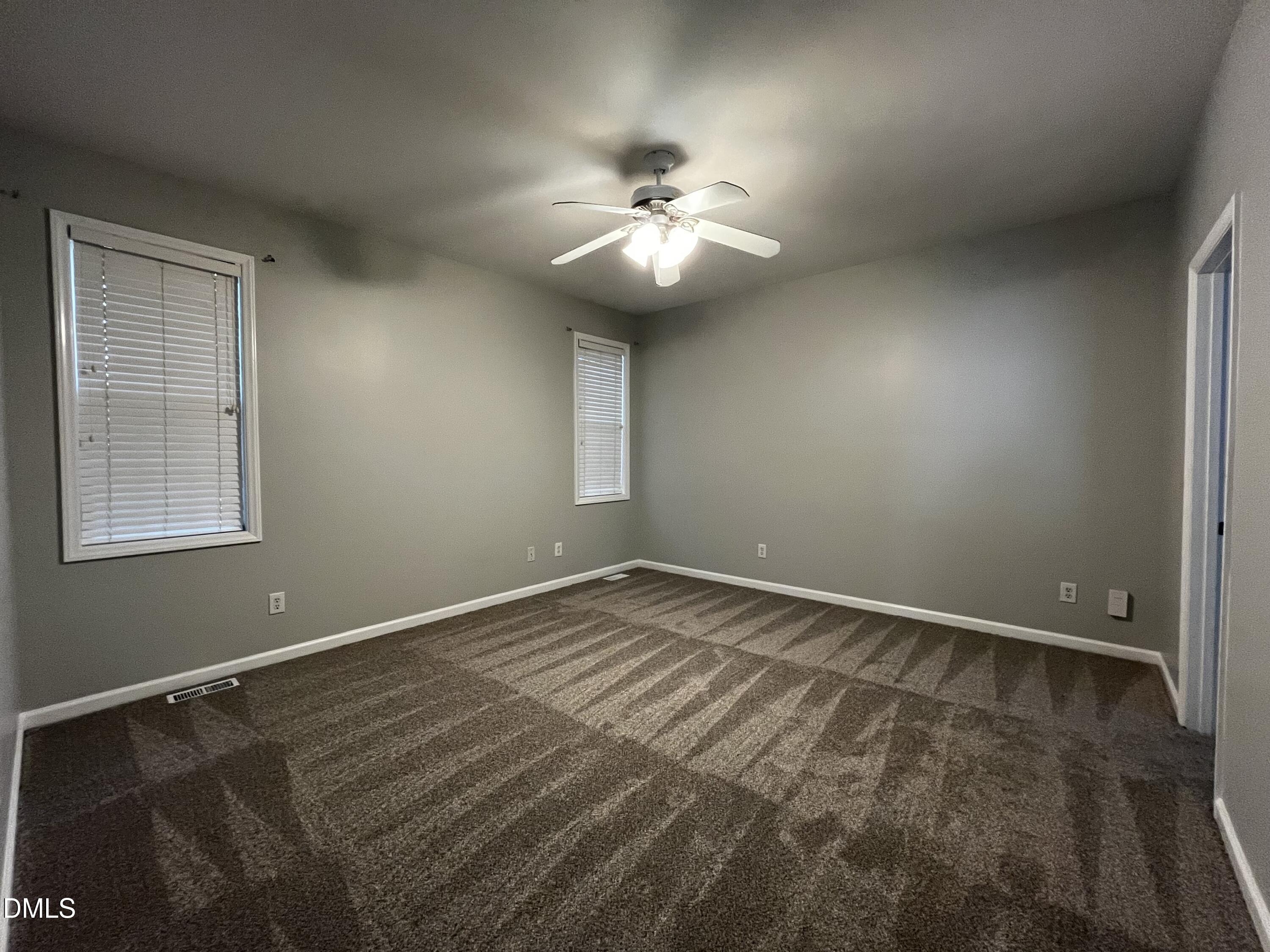 2816 Rainford Court Raleigh, NC 27603 - Photo 6 of 17 a view of an empty room with a window