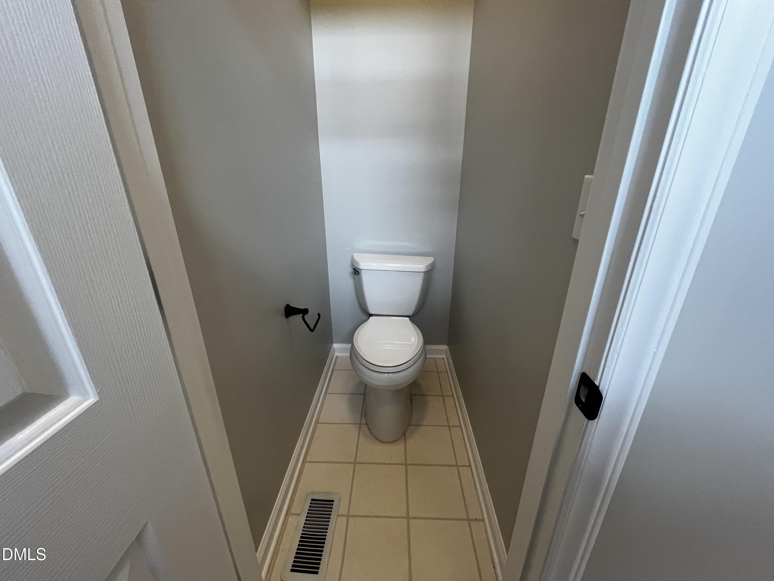 2816 Rainford Court Raleigh, NC 27603 - Photo 9 of 17 a bathroom with a sink and a toilet