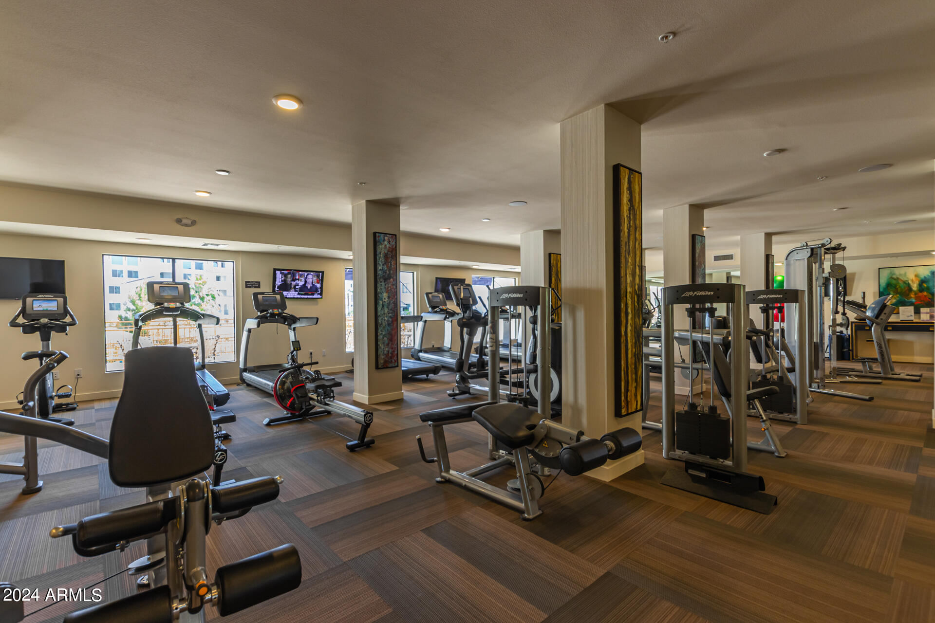 2511 West Queen Creek Road, Unit 374 Chandler, AZ 85248 - Photo 48 of 63 a view of a room with gym equipment