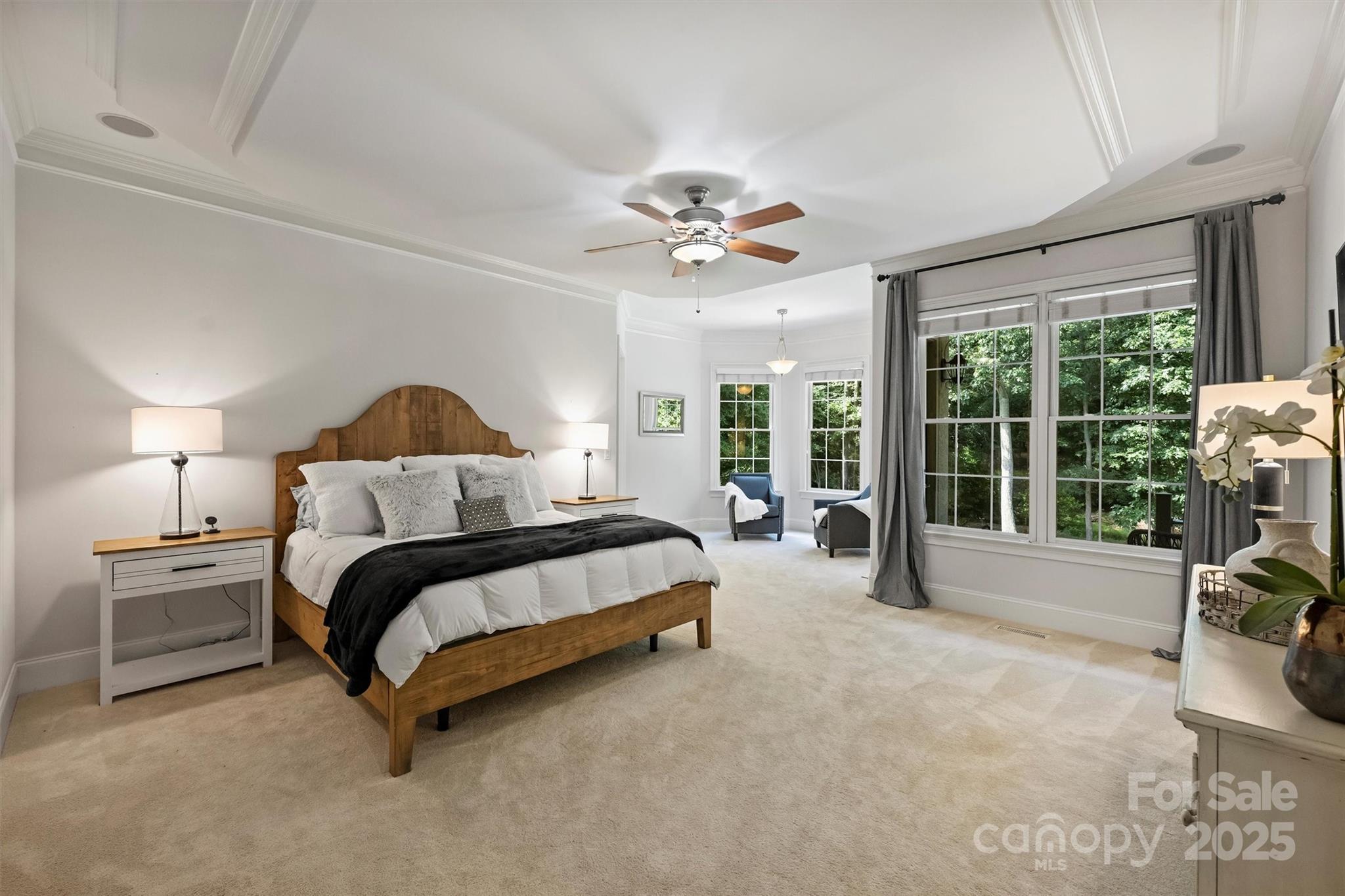 3284 Millstone Creek Road Lancaster, SC 29720 - Photo 21 of 48 a spacious bedroom with a bed and a large window with the outer view