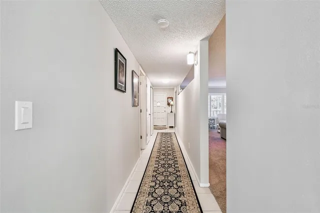 a kitchen with appliances cabinets and a counter top space
