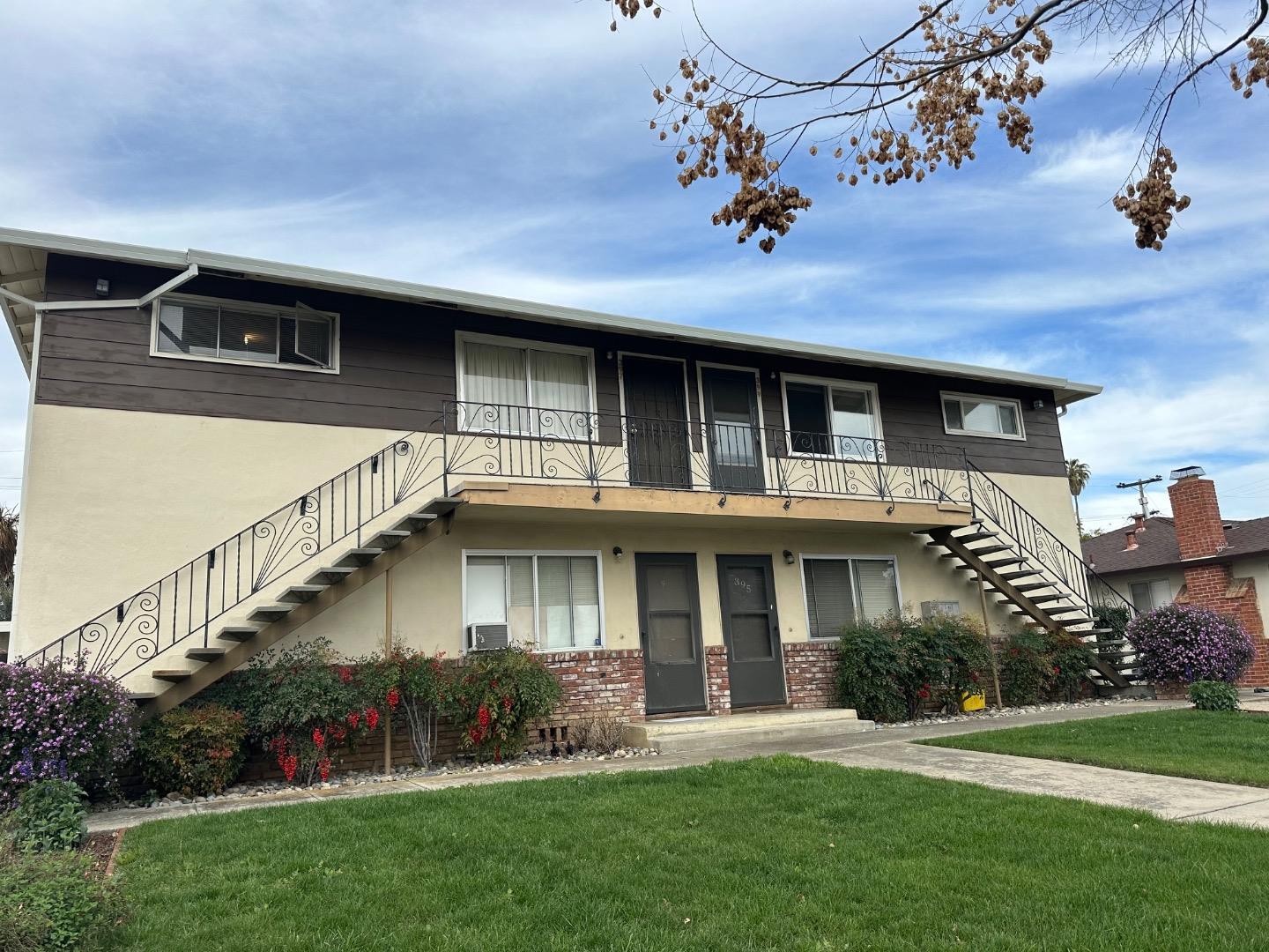 399 Dunster Drive Campbell, CA 95008 - Photo 1 of 1 a front view of a house with a garden