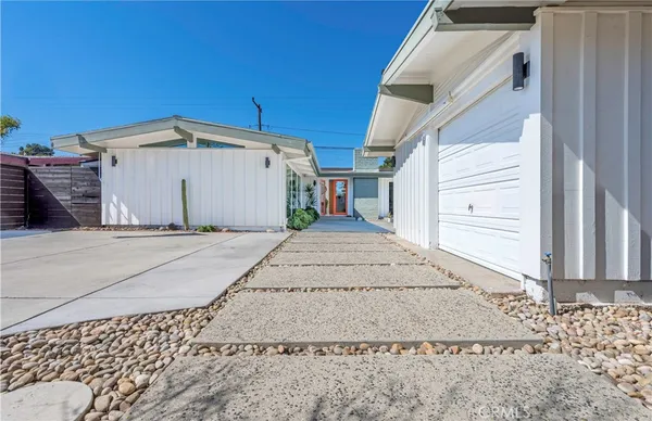 a white house with a outdoor space