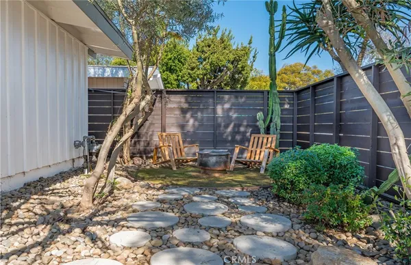 a backyard of a house with seating space