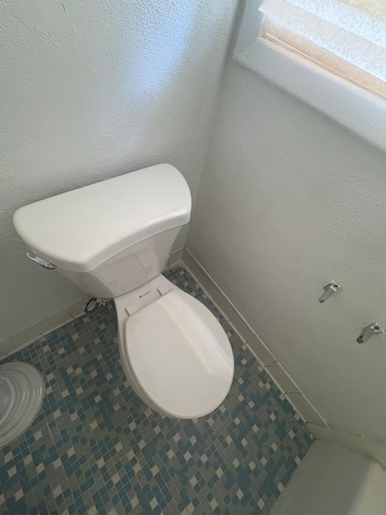 1208 Bismark Drive Columbus, GA 31907 - Photo 8 of 9 a close view of a toilet in a bathroom