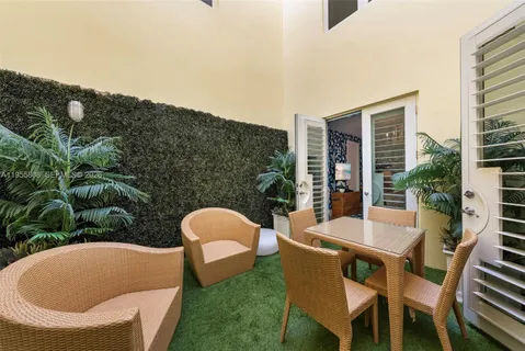 a outdoor living space with furniture and city view