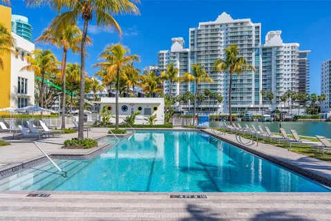 a view of a swimming pool with a patio