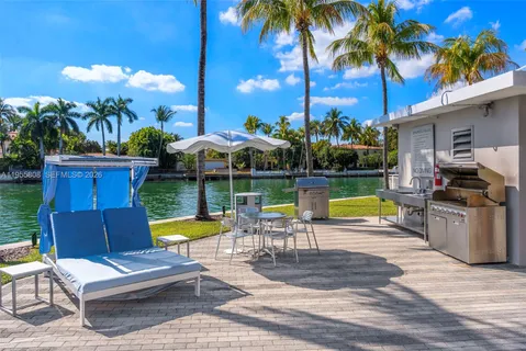 a view of a swimming pool with a lounge chairs