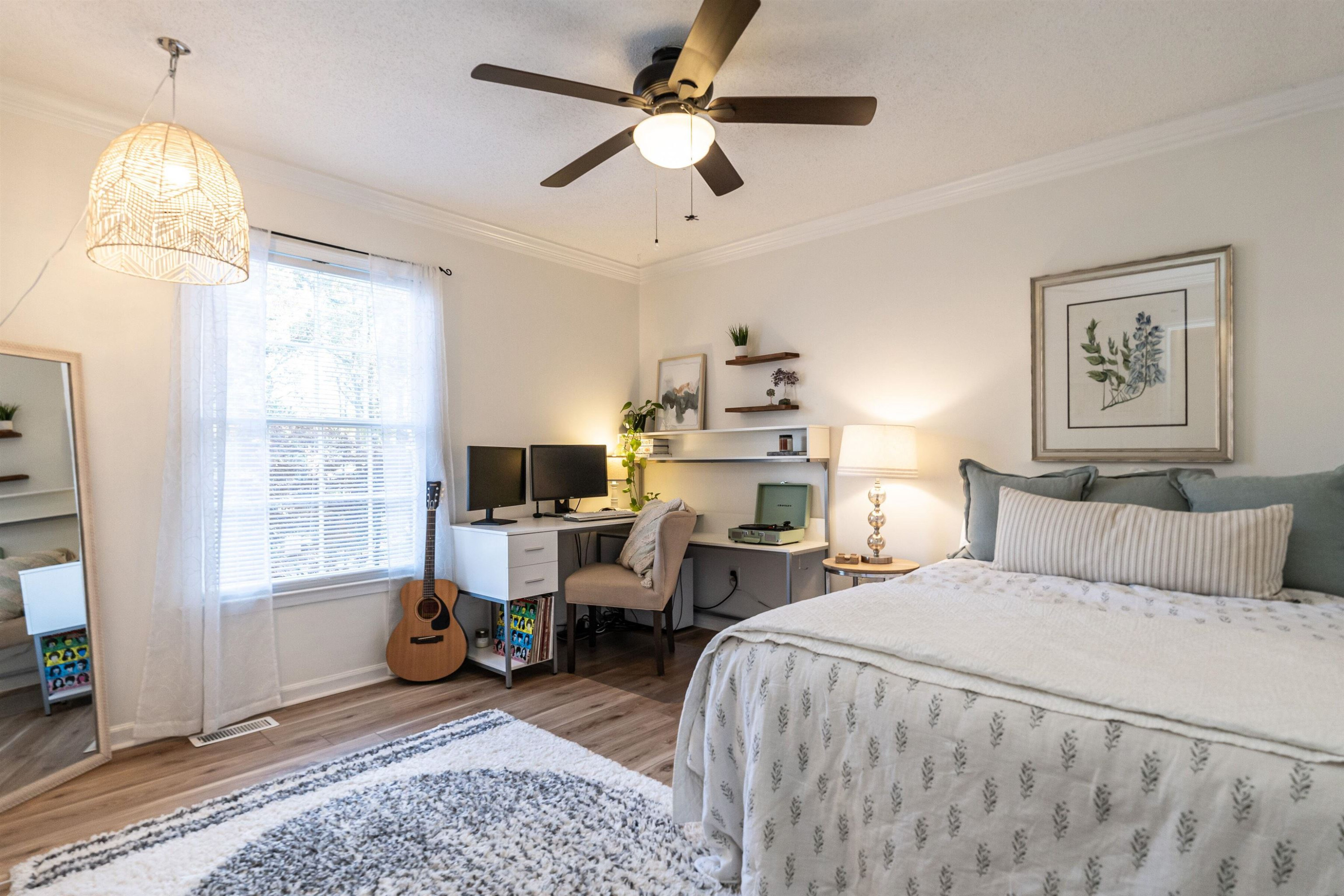 4305 Old Colony Road Raleigh, NC 27613 - Photo 19 of 33 a bed room with a bed and a chair
