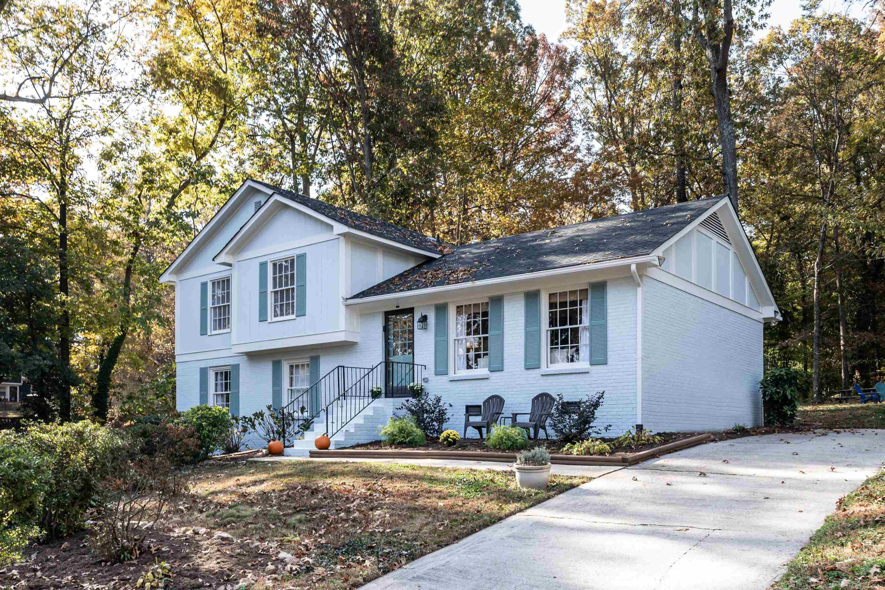 4305 Old Colony Road Raleigh, NC 27613 - Photo 2 of 33 a front view of a house with a yard