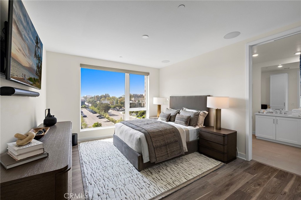 1500 Rivington Irvine, CA 92612 - Photo 14 of 37 a bedroom with a bed and a couch