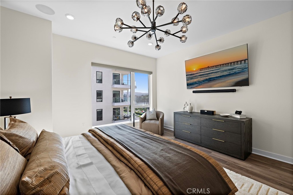 1500 Rivington Irvine, CA 92612 - Photo 19 of 37 a bedroom with a bed dresser and a window