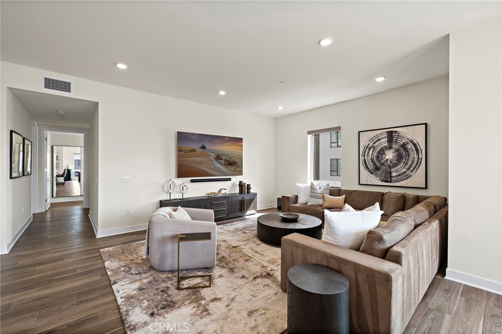 1500 Rivington Irvine, CA 92612 - Photo 5 of 37 a living room with furniture and a flat screen tv