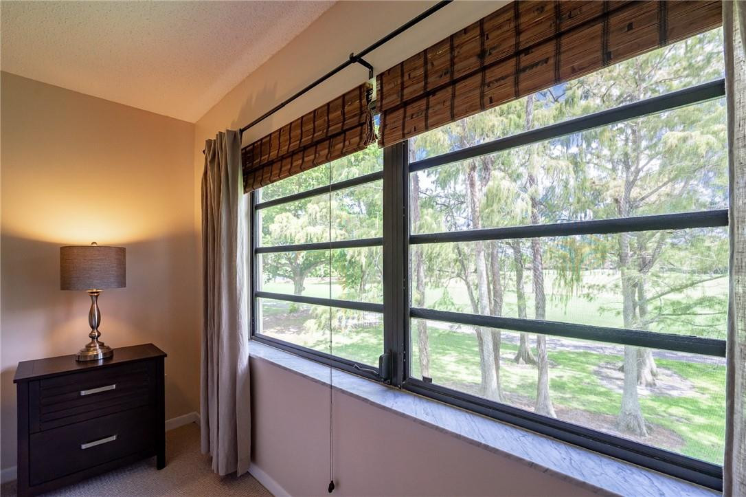 21650 Juego Circle, Unit 24F Boca Raton, FL 33433 - Photo 16 of 24 a view of a room with a window