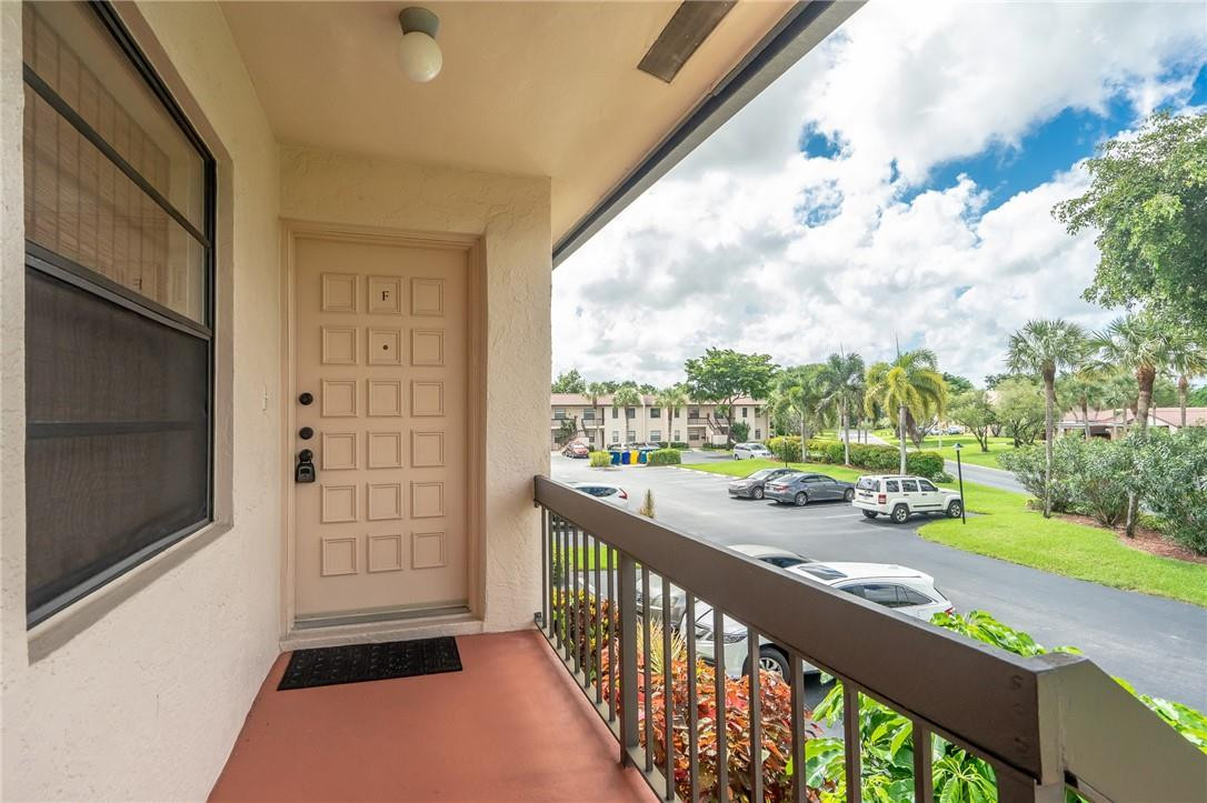 21650 Juego Circle, Unit 24F Boca Raton, FL 33433 - Photo 2 of 24 a view of city from a balcony