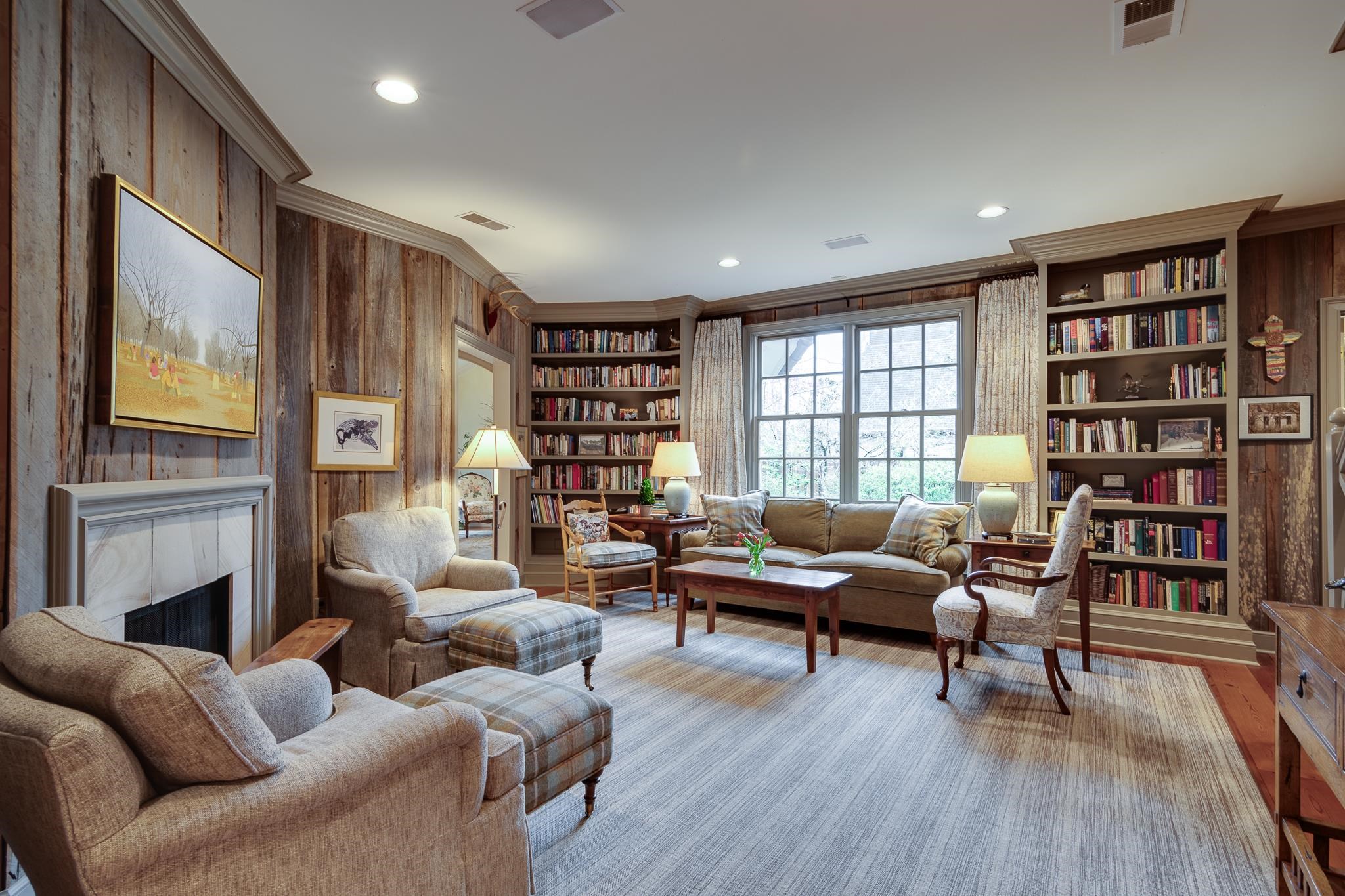 160 Cherry Road Memphis, TN 38117 - Photo 21 of 39 a living room with fireplace furniture and a book shelf