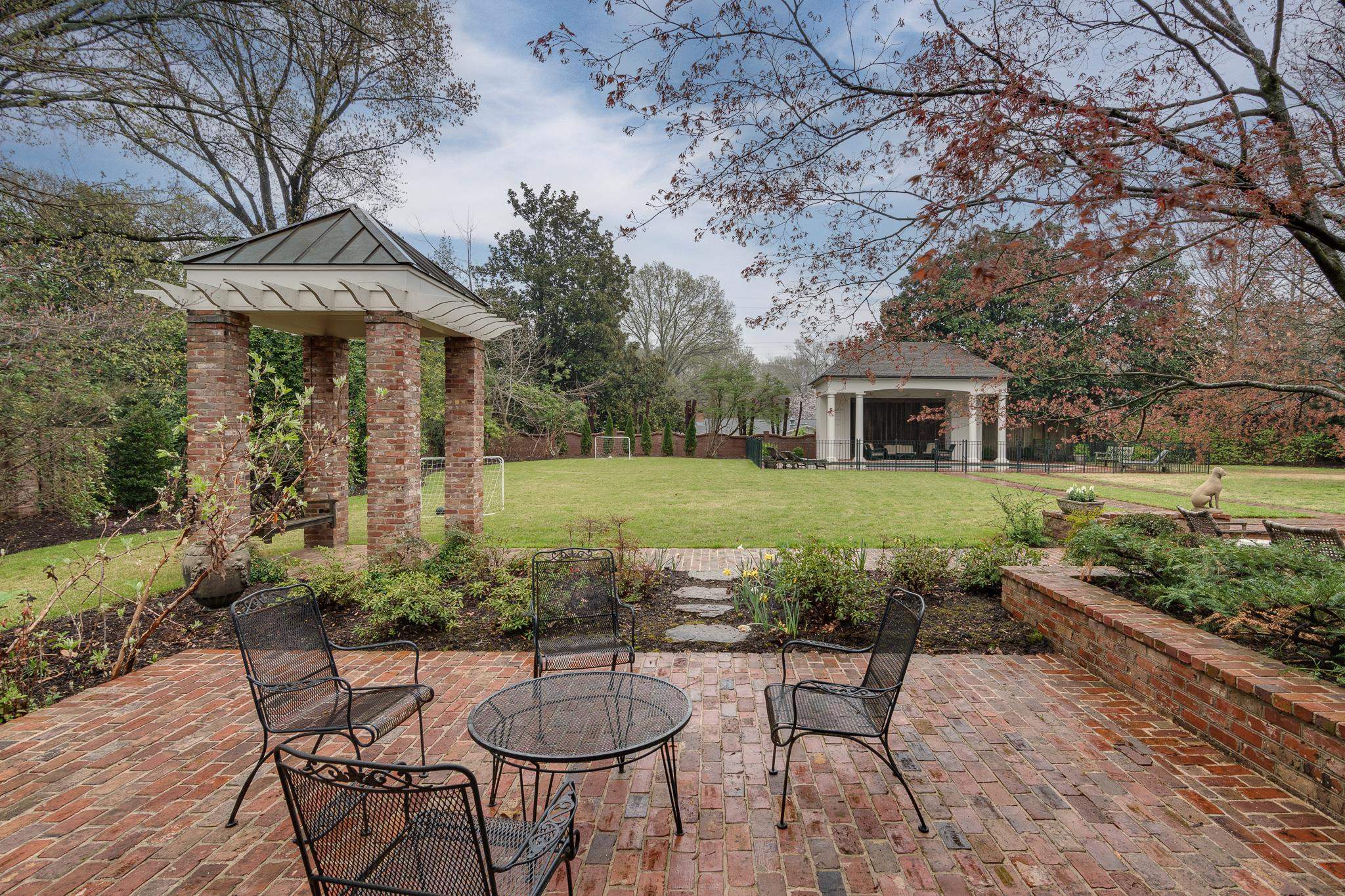160 Cherry Road Memphis, TN 38117 - Photo 36 of 39 a swimming pool with outdoor seating and yard