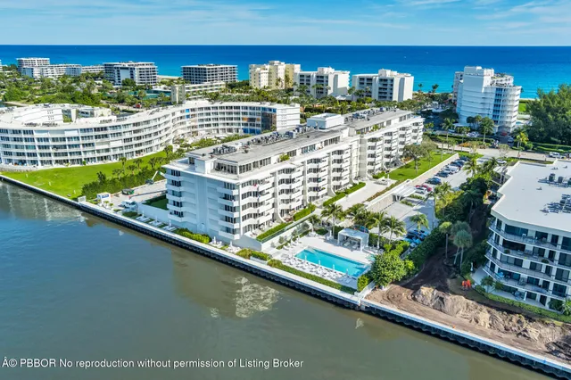 a view of swimming pool with a balcony