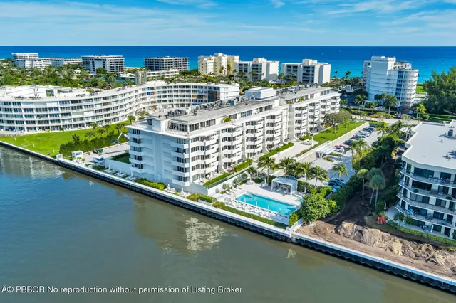 a view of swimming pool with a balcony