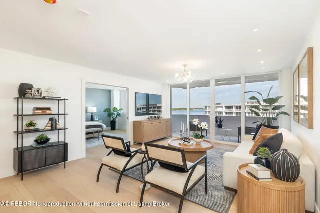 a living room with furniture and a table
