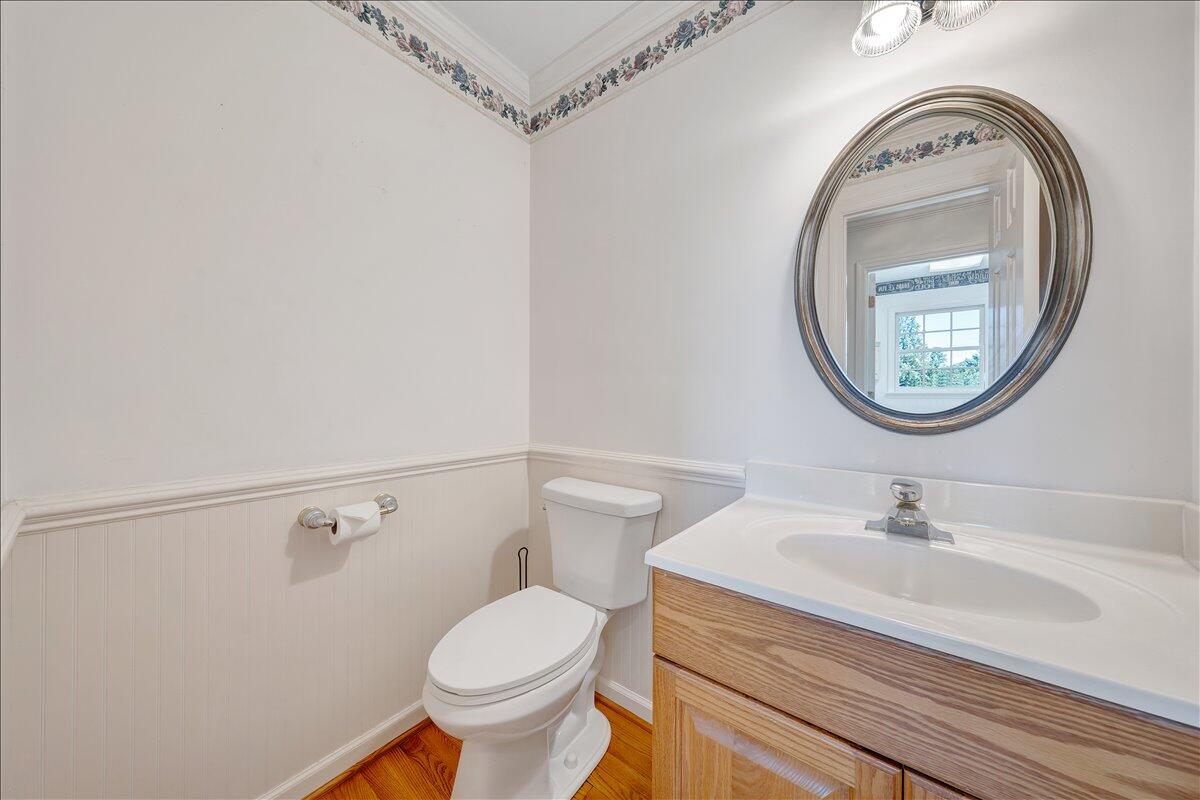 3991 Green Level Road Rocky Mount, VA 24151 - Photo 13 of 49 a bathroom with a sink a mirror and a toilet