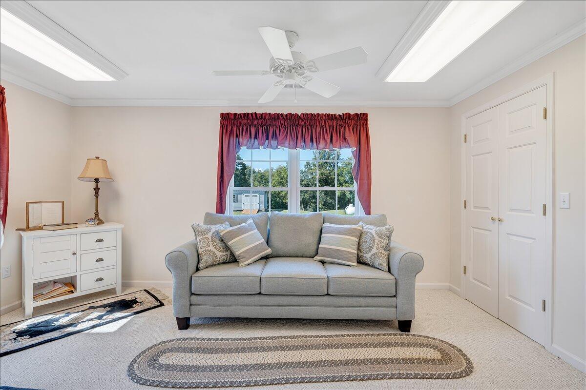 3991 Green Level Road Rocky Mount, VA 24151 - Photo 22 of 49 a living room with furniture a bed and a window