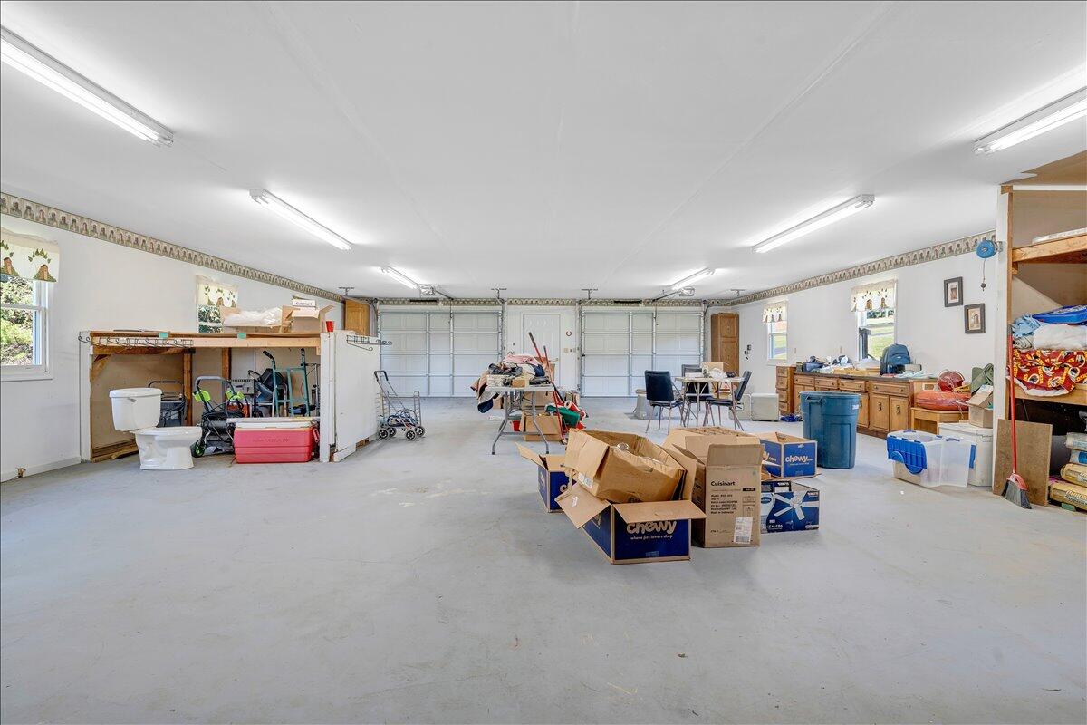3991 Green Level Road Rocky Mount, VA 24151 - Photo 28 of 49 a living room with lots of furniture and a garage
