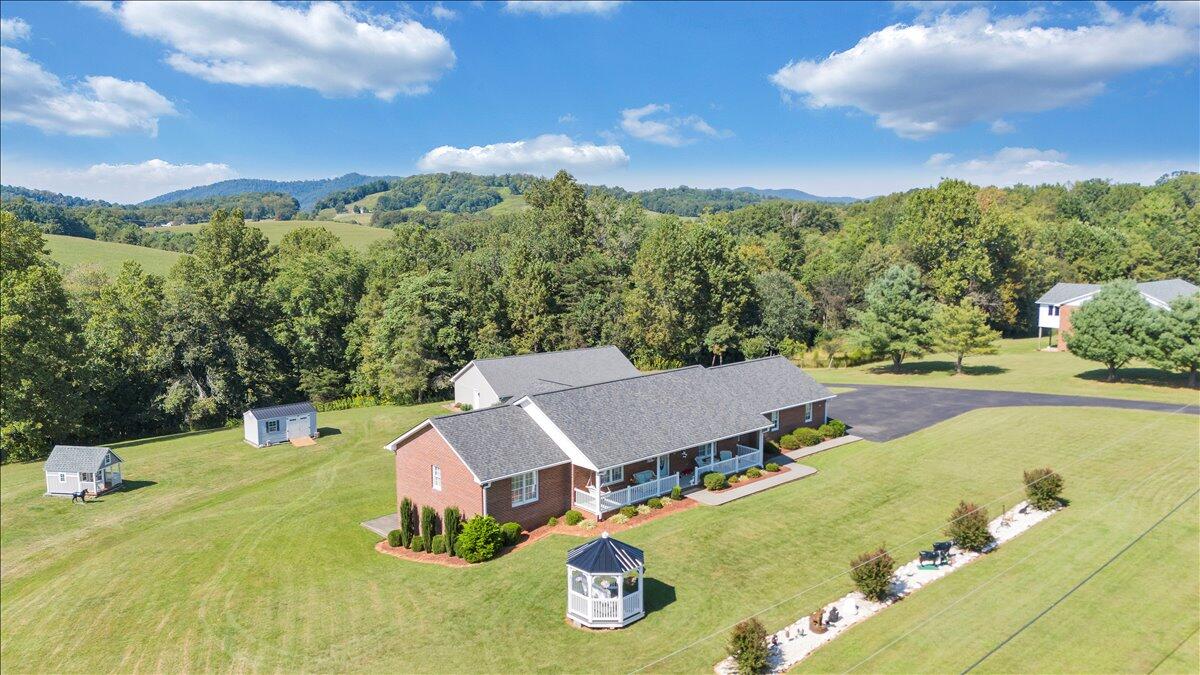3991 Green Level Road Rocky Mount, VA 24151 - Photo 44 of 49 a view of a swimming pool with a patio and a yard