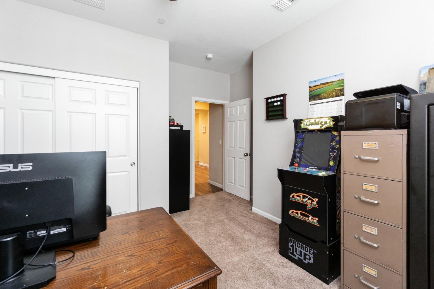 14340 West David Avenue Kerman, CA 93630 - Photo 19 of 30 a living room with furniture and a air conditioner vent