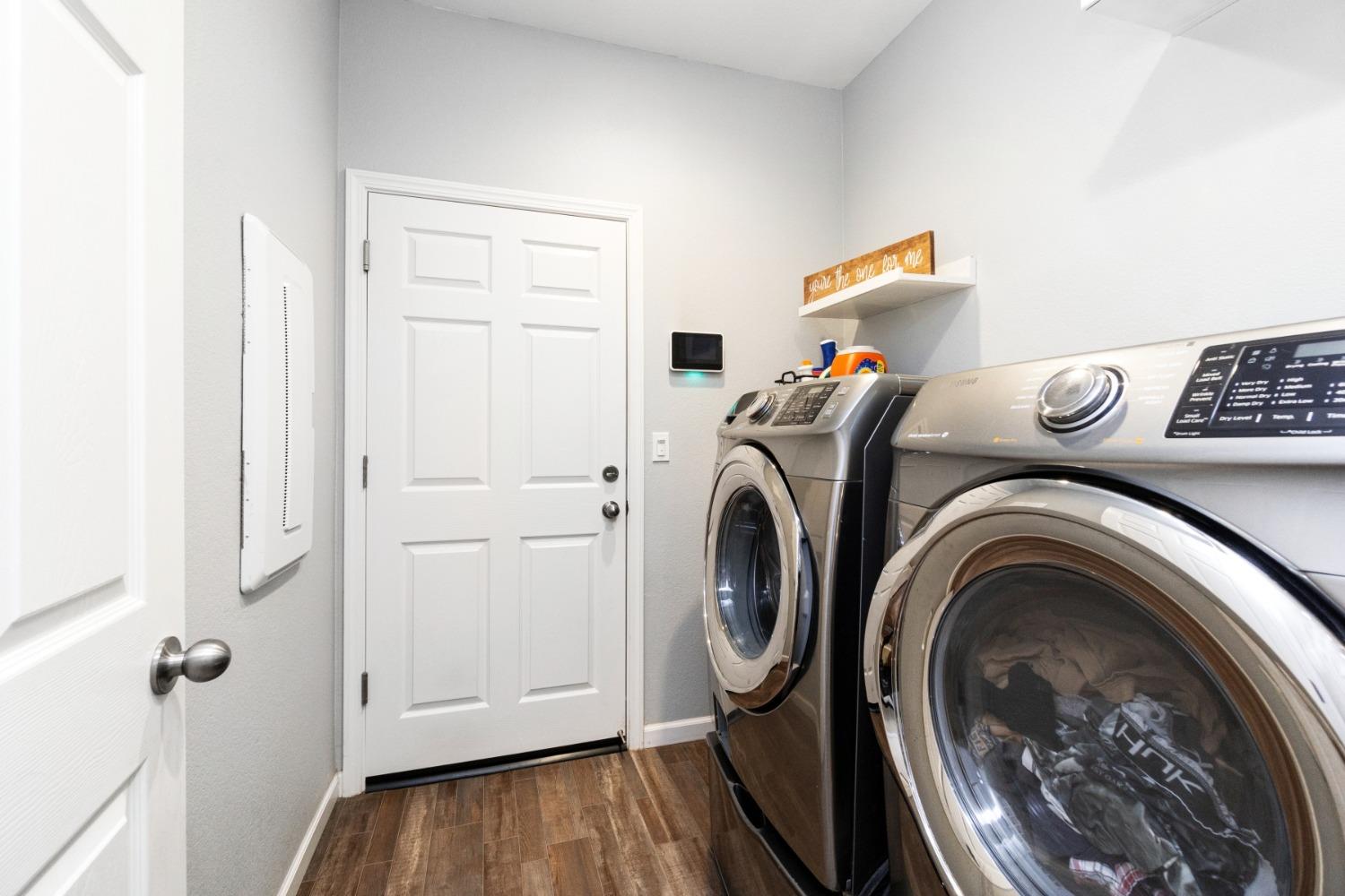 14340 West David Avenue Kerman, CA 93630 - Photo 23 of 30 a utility room with dryer and washer