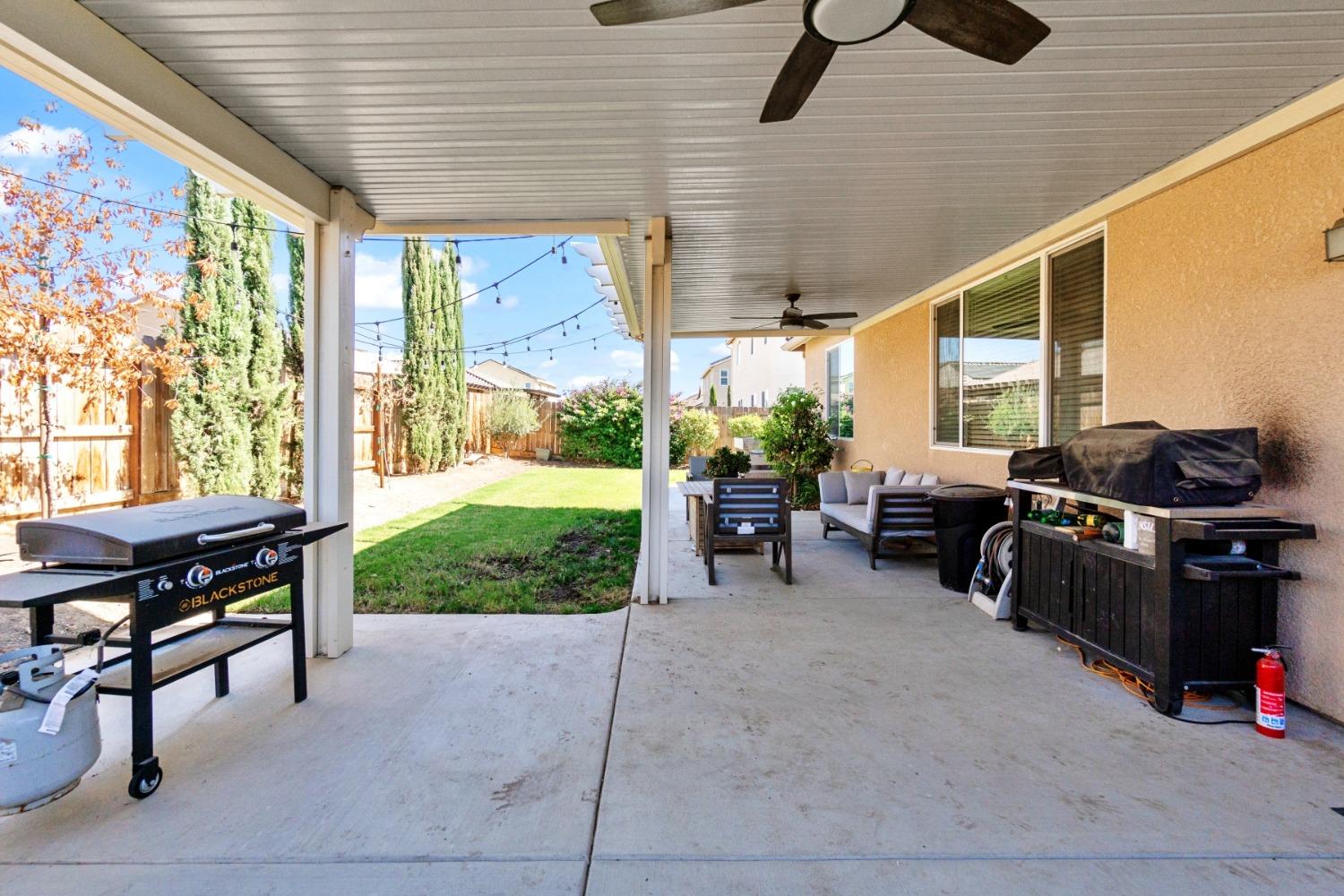 14340 West David Avenue Kerman, CA 93630 - Photo 27 of 30 a outdoor space with chairs