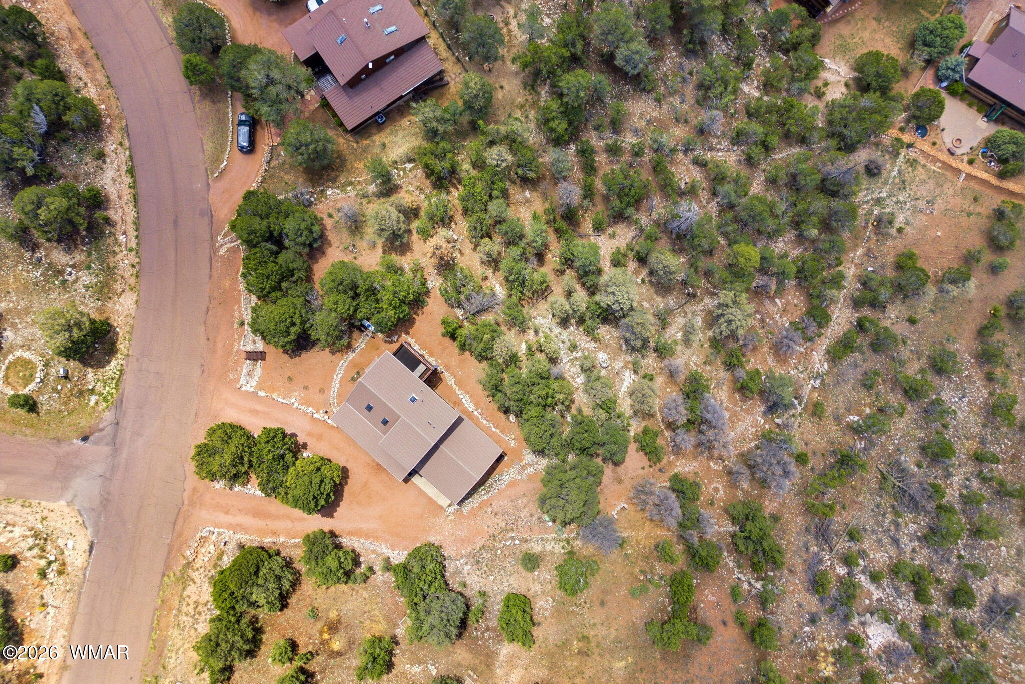 2806 Sky Hawk Drive Overgaard, AZ 85933 - Photo 37 of 43 an aerial view of a house with a yard