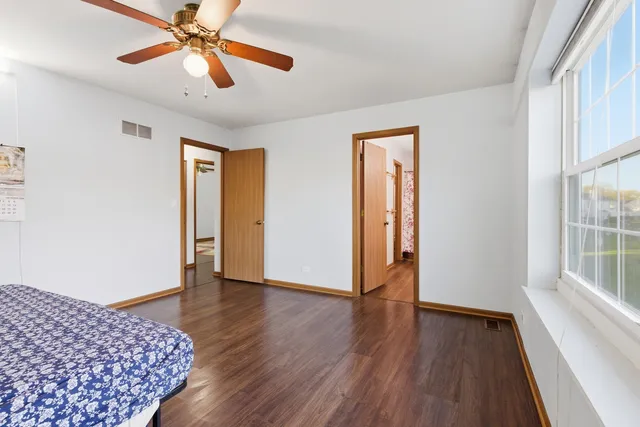 a bathroom with a sink a mirror and a shower
