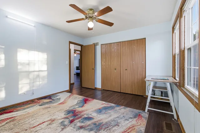 a bathroom with a sink toilet and a mirror