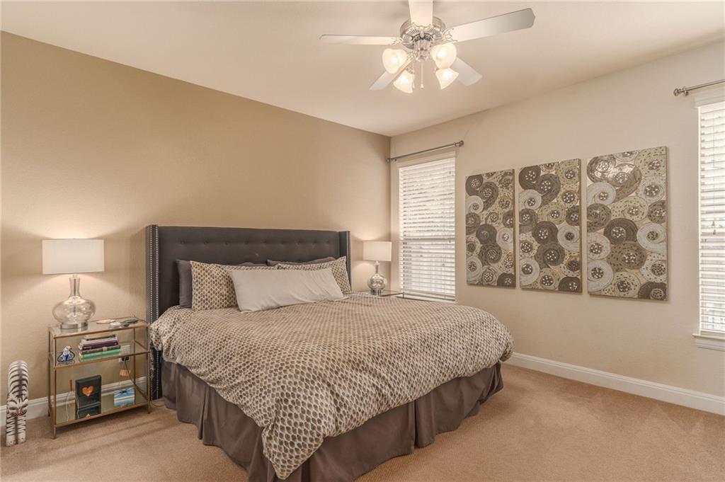 6708 Menchaca Road, Unit 14 Austin, TX 78745 - Photo 7 of 22 Room featuring neutral-toned carpet flooring and walls