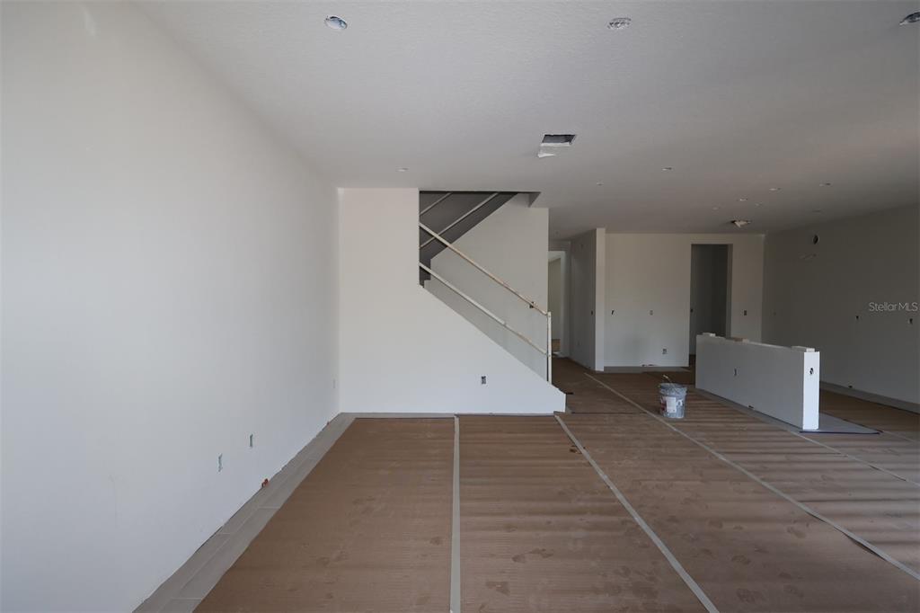 5291 High Line Drive St. Cloud, FL 34771 - Photo 11 of 24 wooden floor in an empty room with a window