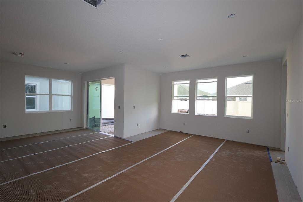 5291 High Line Drive St. Cloud, FL 34771 - Photo 12 of 24 a view of an empty room with windows