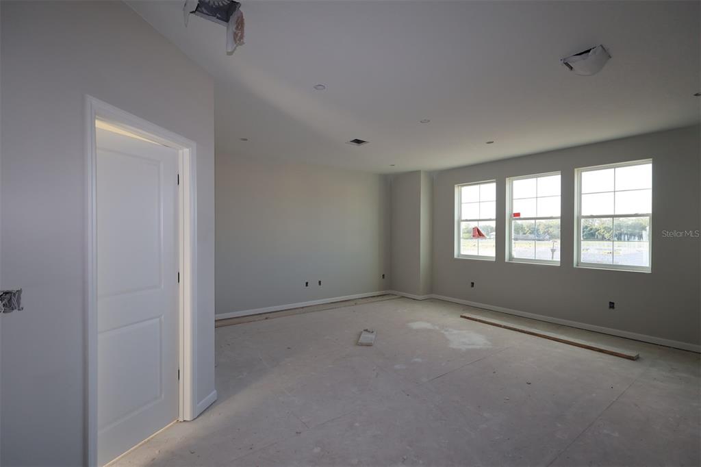 5291 High Line Drive St. Cloud, FL 34771 - Photo 14 of 24 a view of an empty room with a window