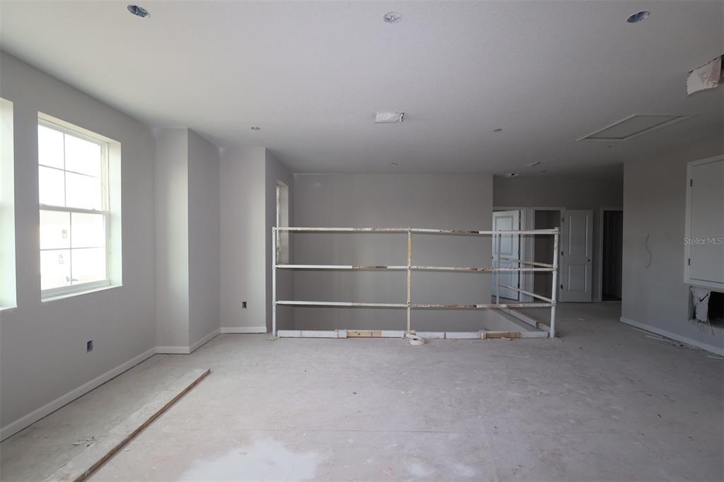 5291 High Line Drive St. Cloud, FL 34771 - Photo 15 of 24 a view of an empty room with a window
