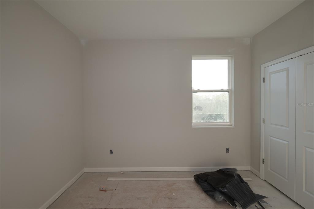 5291 High Line Drive St. Cloud, FL 34771 - Photo 16 of 24 a room that has a window in it